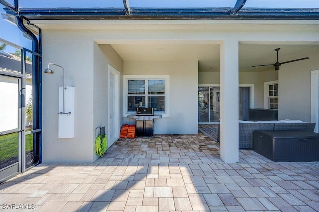 view of patio with ceiling fan