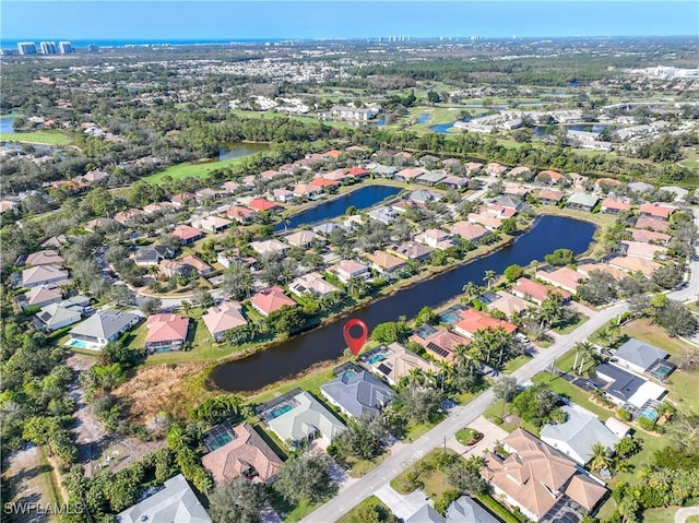 drone / aerial view with a water view