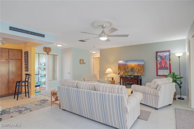 living room with ceiling fan