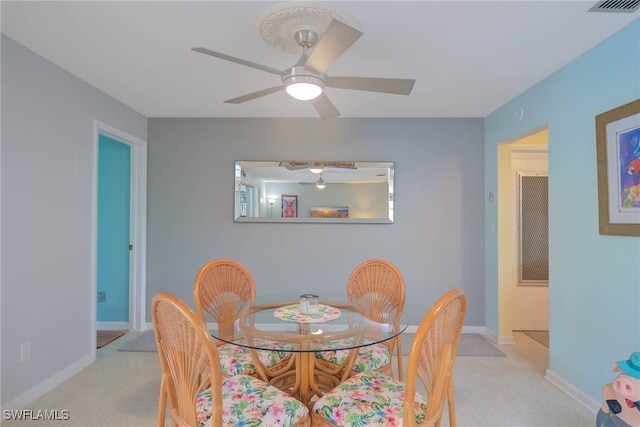 dining area featuring ceiling fan