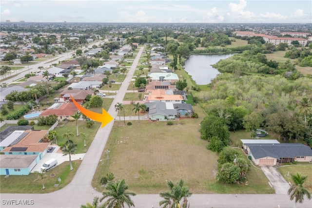 drone / aerial view featuring a water view