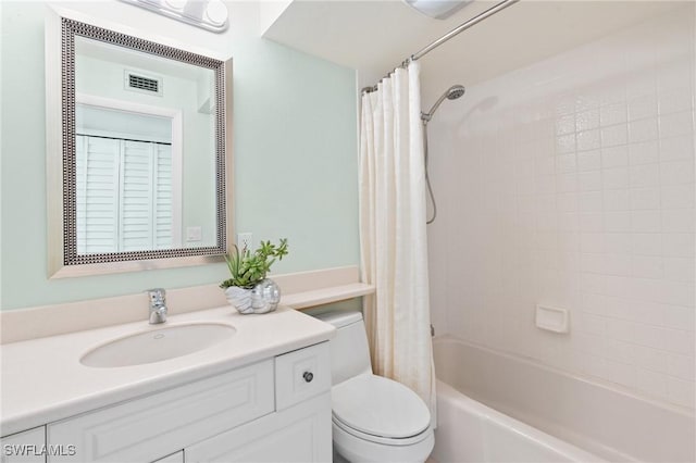 full bath with toilet, vanity, shower / bath combo with shower curtain, and visible vents