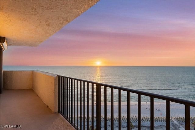 balcony at dusk with a water view