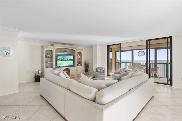 living room featuring light tile patterned floors, floor to ceiling windows, baseboards, and crown molding