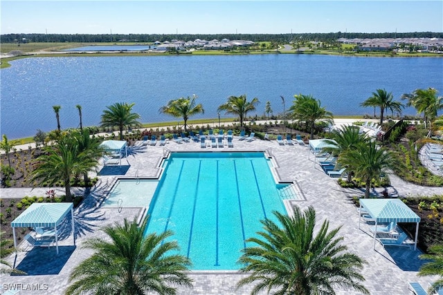 4075 Pegasus Way, Naples, FL 34120 - community pool featuring a water view and a patio area