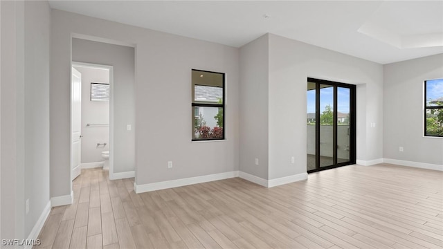 4075 Pegasus Way, Naples, FL 34120 - empty room featuring light wood finished floors and baseboards