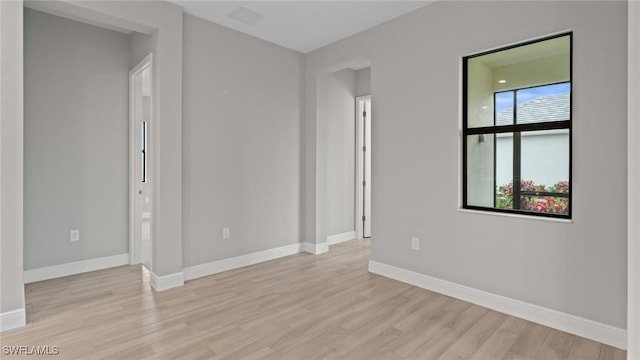 4075 Pegasus Way, Naples, FL 34120 - empty room with light wood-style flooring and baseboards