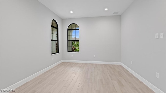4075 Pegasus Way, Naples, FL 34120 - empty room featuring light wood-style floors, baseboards, and recessed lighting