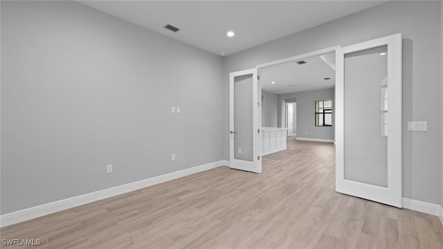 4075 Pegasus Way, Naples, FL 34120 - empty room with light wood finished floors, baseboards, and recessed lighting