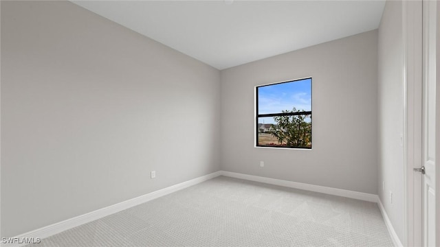 4075 Pegasus Way, Naples, FL 34120 - unfurnished room featuring light colored carpet and baseboards