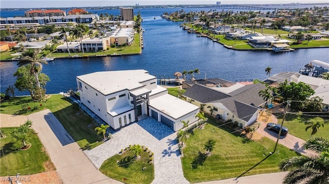 birds eye view of property featuring a water view