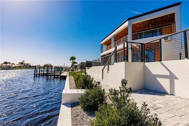 dock area with a water view