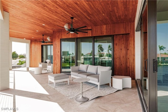 view of patio / terrace featuring ceiling fan