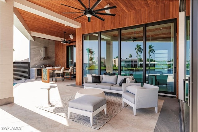 view of patio / terrace featuring an outdoor living space and ceiling fan