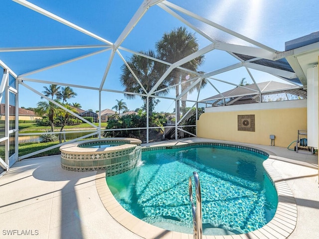 view of swimming pool featuring a lanai, an in ground hot tub, and a patio