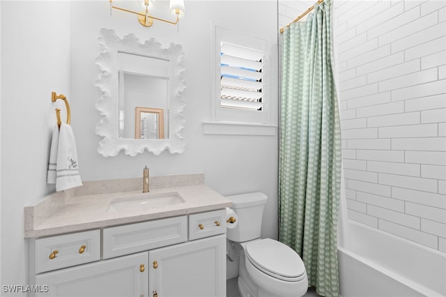 full bathroom with toilet, shower / bath combination with curtain, a chandelier, and vanity