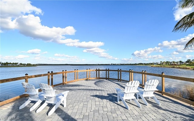 dock area with a water view