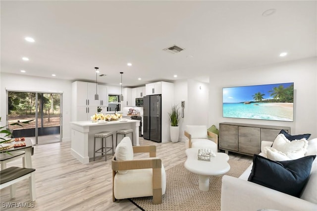 living room featuring light hardwood / wood-style flooring