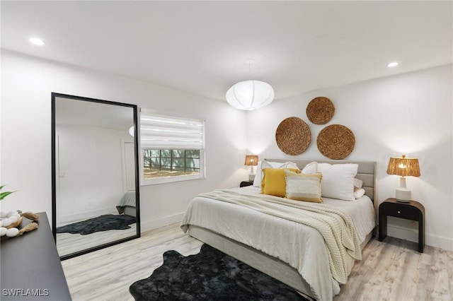 bedroom featuring light hardwood / wood-style flooring