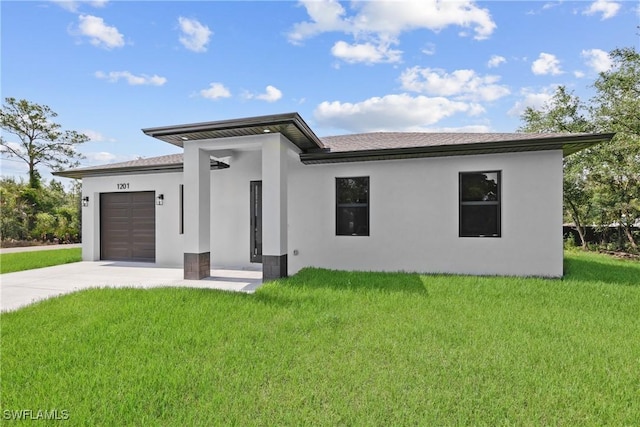 1201 E 7th St, Lehigh Acres, FL 33972 - view of front facade featuring stucco siding, driveway, a front yard, a garage, and roof with shingles