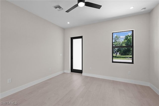 1201 E 7th St, Lehigh Acres, FL 33972 - spare room with light wood finished floors, ceiling fan, baseboards, recessed lighting, and a smoke detector