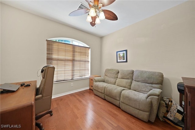 office area featuring hardwood / wood-style flooring, plenty of natural light, and ceiling fan