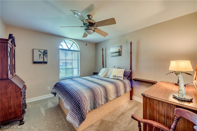 bedroom with light colored carpet and ceiling fan