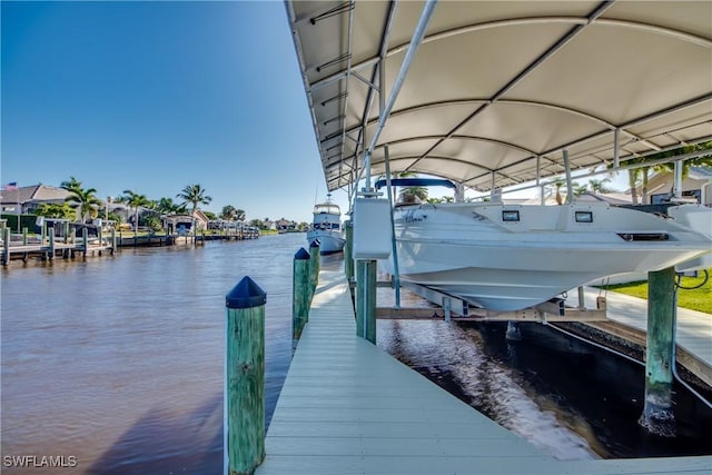 dock area featuring a water view