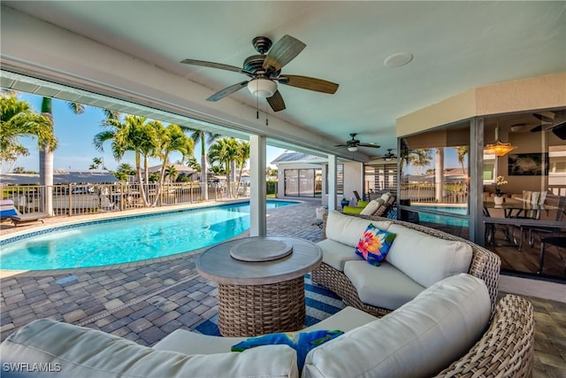 view of swimming pool with a patio and an outdoor hangout area