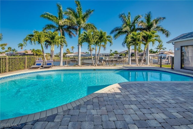 view of swimming pool featuring a patio