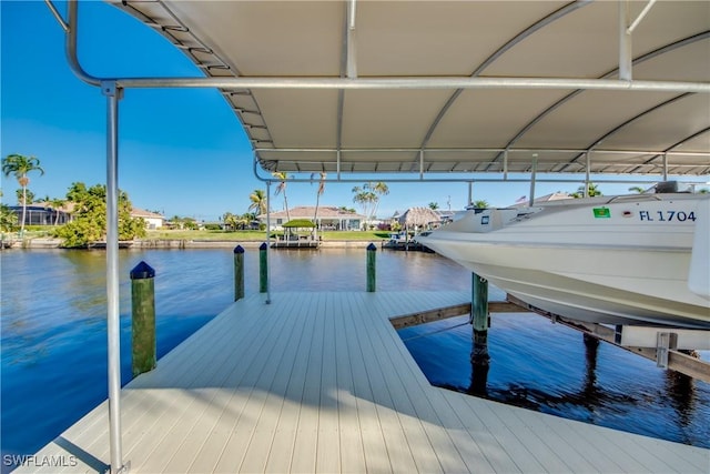 dock area featuring a water view