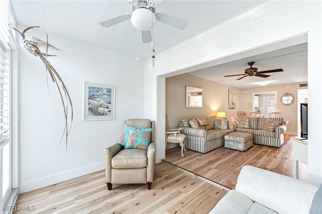 living room with light hardwood / wood-style floors