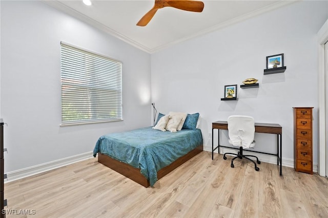 bedroom with crown molding, ceiling fan, and light wood-type flooring