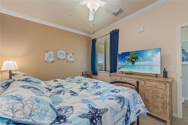 bedroom featuring ceiling fan, ornamental molding, and carpet floors