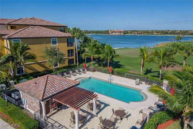 view of pool featuring a pergola, a water view, and a patio area