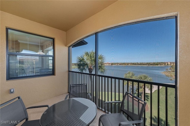 sunroom with a water view