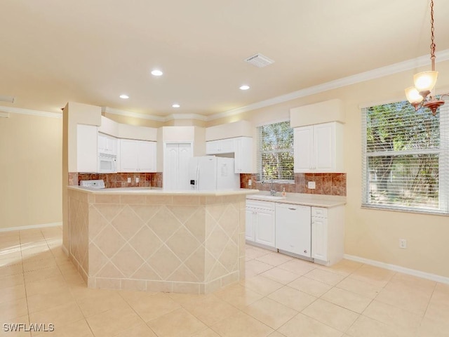 kitchen featuring white cabinetry, white appliances, backsplash, hanging light fixtures, and crown molding