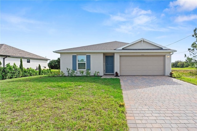 ranch-style house with a garage and a front yard