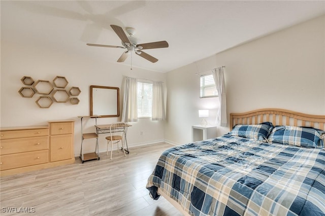 bedroom featuring ceiling fan and light wood-type flooring