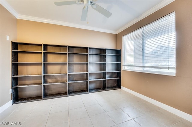 tiled empty room featuring crown molding and ceiling fan