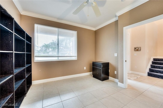 misc room featuring tile patterned flooring, crown molding, and ceiling fan