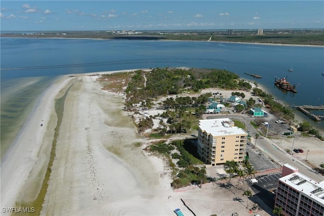 bird's eye view with a view of the beach and a water view