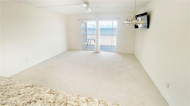 100 Estero Blvd Unit 434, Fort Myers Beach, FL 33931 - unfurnished room with light carpet, a ceiling fan, and baseboards