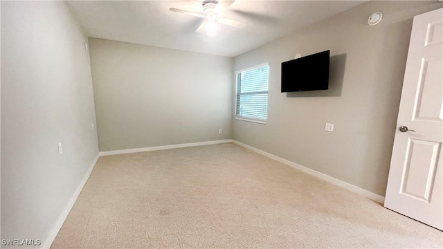 100 Estero Blvd Unit 434, Fort Myers Beach, FL 33931 - spare room featuring light carpet, ceiling fan, and baseboards