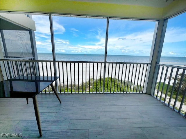 100 Estero Blvd Unit 434, Fort Myers Beach, FL 33931 - unfurnished sunroom featuring a water view