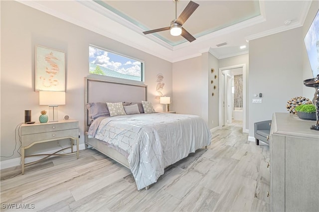 bedroom with crown molding, a raised ceiling, and ceiling fan