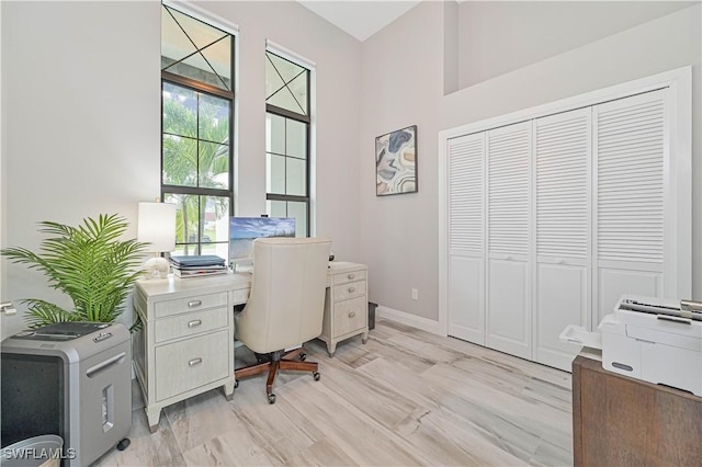 office space featuring light hardwood / wood-style floors