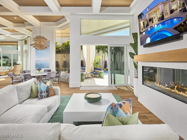 interior space with beamed ceiling and coffered ceiling