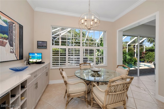 dining space with light tile patterned floors, ornamental molding, and a notable chandelier