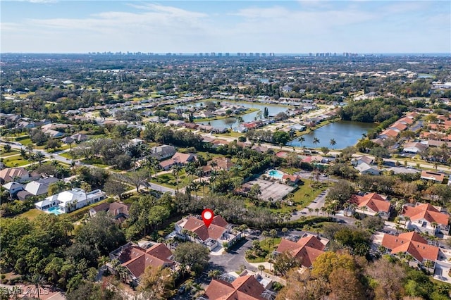 bird's eye view with a water view